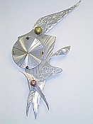 abstract clock in metal and brushed aluminum