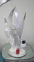 small sculpture in brushed aluminum