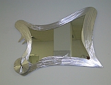 abstract mirror with clock in brushed aluminum