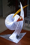 ultra modern sculpture and a tabletop sculpture in contemporary sculpture design
