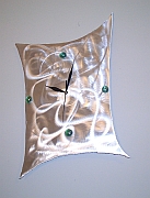 modern contemporary clock in aluminum