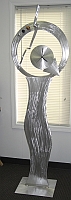 standing clock and abstract grandfather clock in aluminum