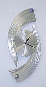 modern wall sculpture clock in brushed aluminum