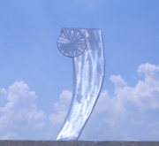 contemporary outdoor sculpture in brushed aluminum