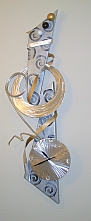 aluminum clock and wood clock and wood clocks