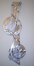 beautiful aluminum clock in aluminum and aluminum balls, very modern