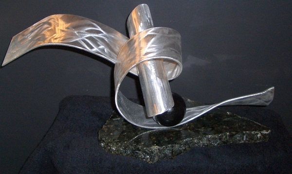 tabletop sculpture in modern abstract sculpture design in aluminum and granite